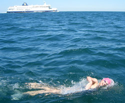 Katie Goodall racing a P&O Ferry during her solo cross channel swim